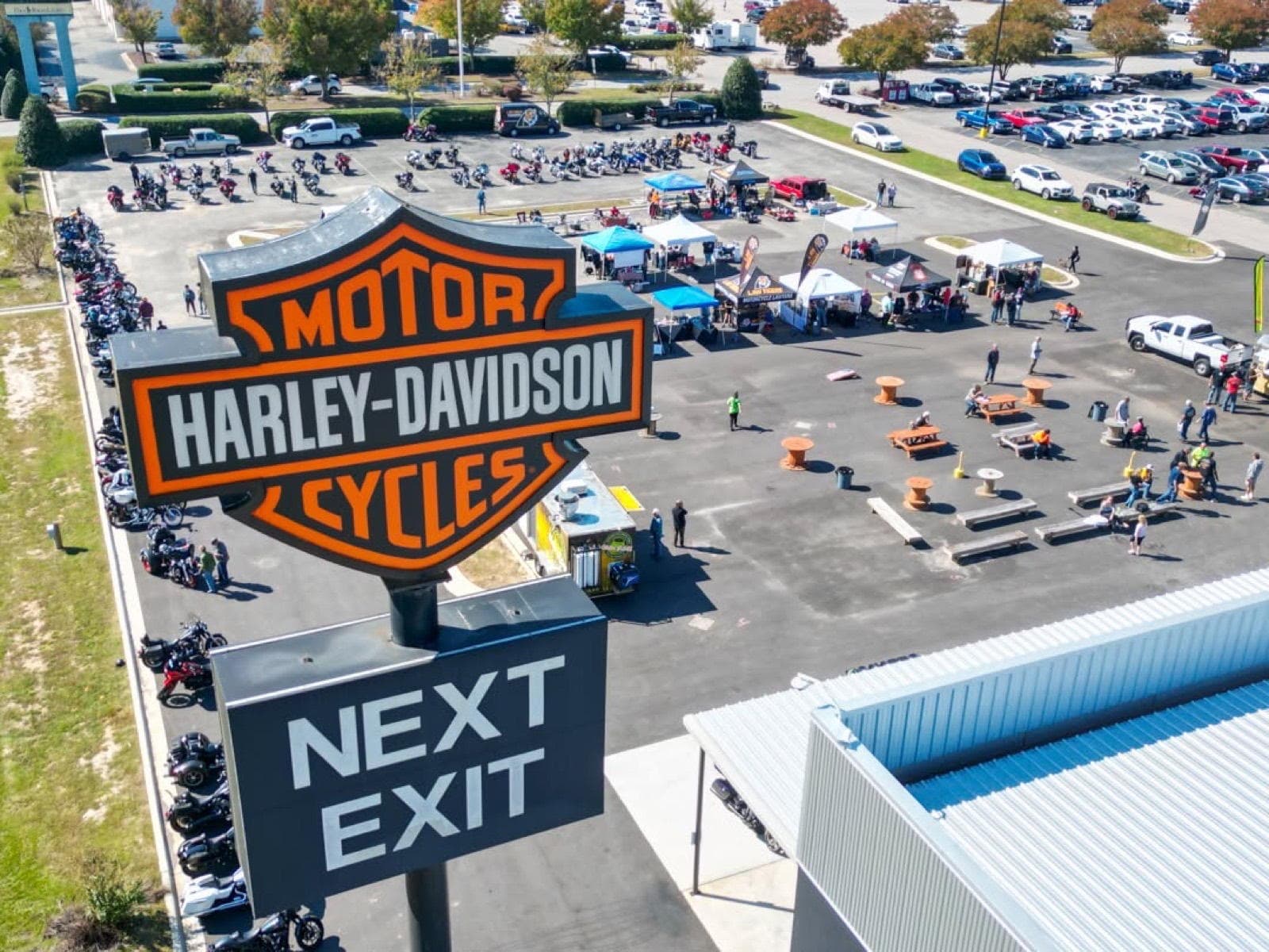 Aerial view of the Bulldog Harley-Davidson lot and Harley-Davidson sign